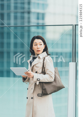 a forty-something woman a forty-something woman 115984315