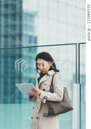 a forty-something woman a forty-something woman 115984319