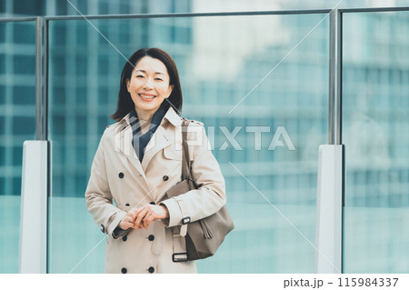 a forty-something woman a forty-something woman 115984337