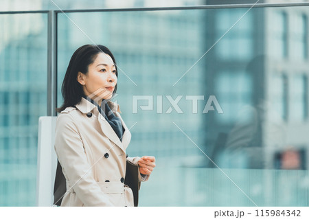 a forty-something woman a forty-something woman 115984342