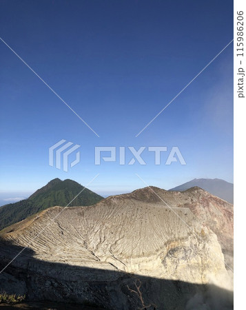 Mountain Landscape With Fog in Kawah Ijen Indonesia 115986206