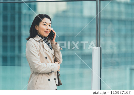 a forty-something woman a forty-something woman 115987167