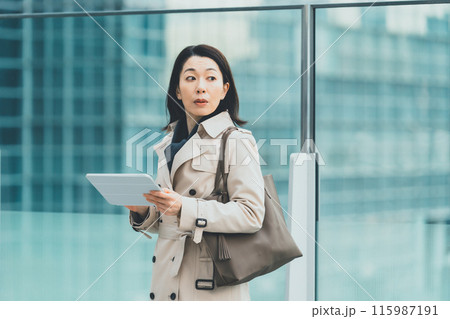 a forty-something woman a forty-something woman 115987191