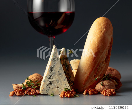 Blue cheese with red wine, baguette, walnuts, and thyme. 115989032