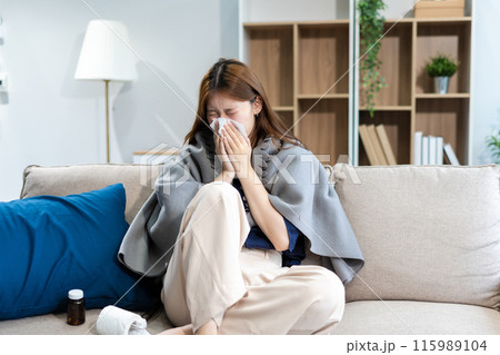 Woman feeling sick and headache, health care concept. 115989104