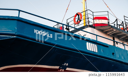 A blue and red boat with the word Ventspill on it A blue and red boat with the word Ventspill on it 115991643