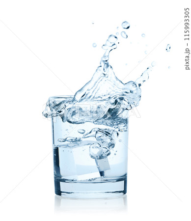 Falling Ice Cubes into the Glass of Water with splash, isolated on white background 115993305