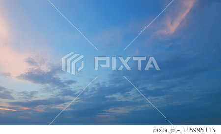 Sky at dusk and cirrocumulus clouds. Breathtaking landscape of phenomenal cirrocumulus clouds. Timelapse. 115995115