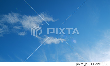 Blue sky white puffy fluffy clouds billow in high space. Sky with clouds weather. Time lapse. 115995387