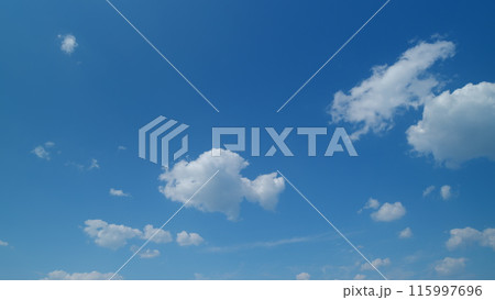 Beautiful white cirrus clouds. Slowly move of white cloudscape. Timelapse. Beautiful white cirrus clouds. Slowly move of white cloudscape. Timelapse. 115997696