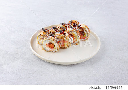 Hot tempura roll with salmon and cheese 115999454