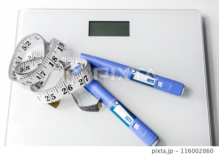 Ozempic Insulin injection pen for diabetics. Concept of losing weight with the drug. Ozempic Insulin injection pen for diabetics. Concept of losing weight with the drug. 116002860