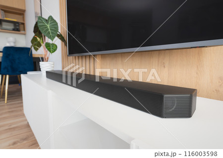 Soundbar in a modern home. Listening to music 116003598