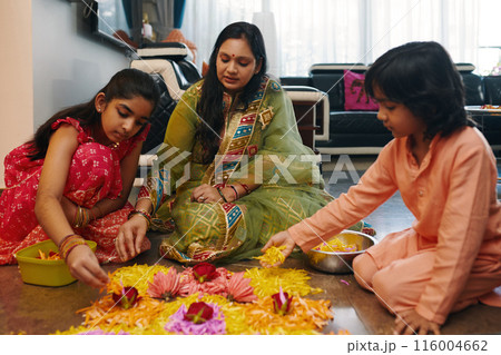 Mom Making Flower Composition With Her Children 116004662