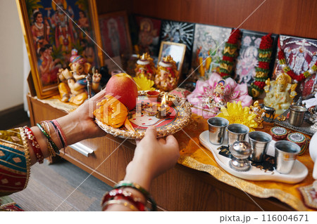 Making Offerings During Praying At Altar 116004671