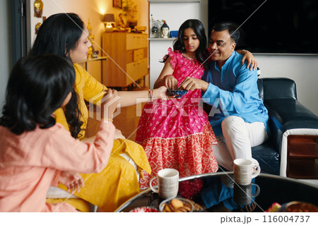 Family Eating Desserts With Children At Home 116004737