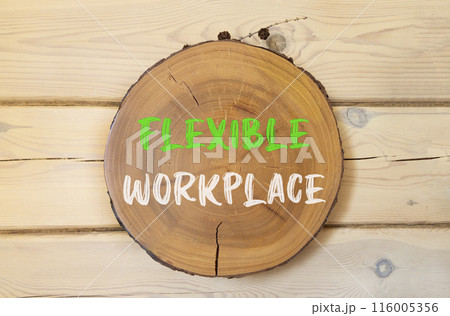 Flexible workplace symbol. Concept words Flexible workplace on beautiful wooden circle. Beautiful wooden wall background. Business Flexible workplace concept. Copy space. 116005356