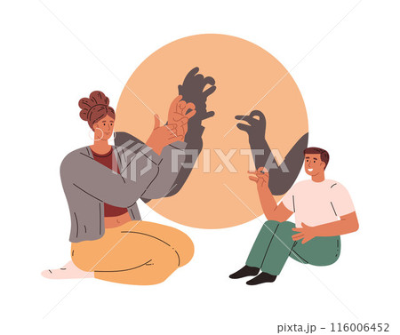 Mother and son create shadow animals during a family vacation. Mother and son create shadow animals during a family vacation. 116006452