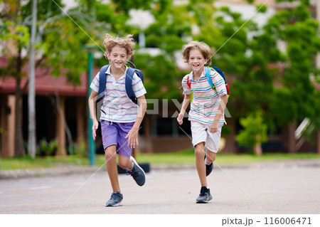 Child happy to be back to school. Child happy to be back to school. 116006471