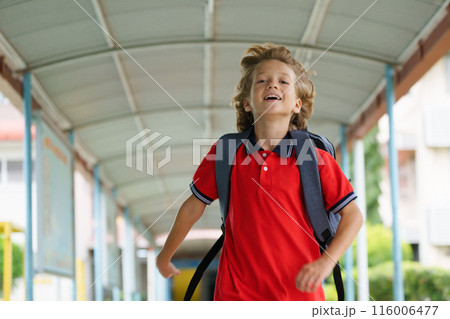 Child happy to be back to school. Child happy to be back to school. 116006477