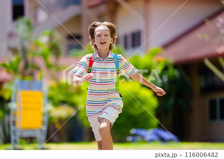 Child happy to be back to school. Child happy to be back to school. 116006482