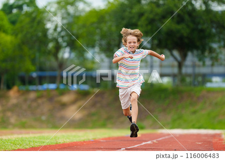 Kids long jump athletics training. Child jumping. Kids long jump athletics training. Child jumping. 116006483