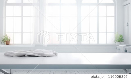 Folded white towels on countertop with laundry machine in background. AIG35. Folded white towels on countertop with laundry machine in background. AIG35. 116006895