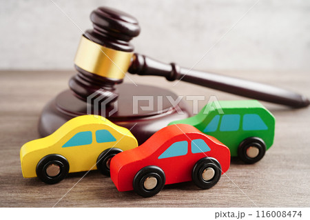 Car accident lawsuit and insurance, Judge hammer with car model. Car accident lawsuit and insurance, Judge hammer with car model. 116008474