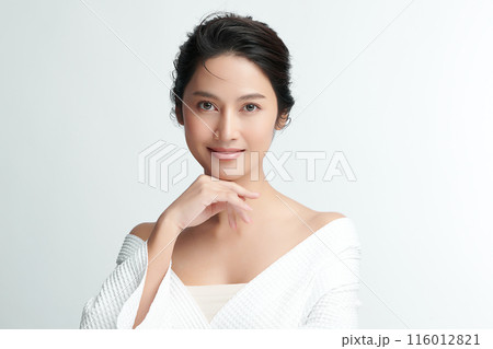 Beautiful young asian woman with clean fresh skin on white background, Face care, Facial treatment, Cosmetology, beauty and spa, Asian women portrait. Beautiful young asian woman with clean fresh skin on white background, Face care, Facial treatment, Cosmetology, beauty and spa, Asian women portrait. 116012821