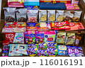 TOKYO, JAPAN - April 11, 2024 :  Mix collection of snacks, food, souvenirs, supplements, beverages clothing and liquor that are popular in Japan for foreign tourists use for background. 116016191