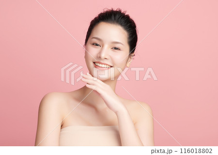 Beautiful young asian woman with clean fresh skin on pink background, Face care, Facial treatment, Cosmetology, beauty and spa, Asian women portrait. 116018802