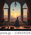 Muslim woman in hijab (Muslim scraft) sitting near the window 116019328