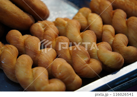 Kkwabaegi is a Korean twisted donut Kkwabaegi is a Korean twisted donut 116026541