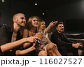 Young men gamers delight in gaming marathon at club 116027527