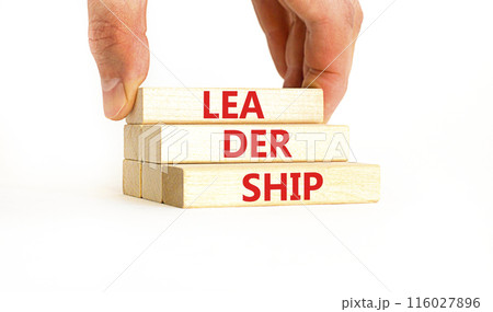 Leadership symbol. Concept word Leadership on beautiful wooden blocks. Businessman hand. Beautiful white background. Business leadership concept. Copy space. 116027896
