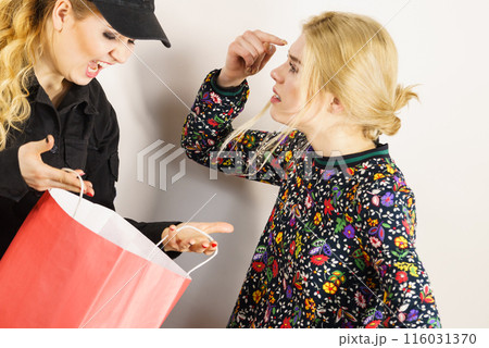 Security guard and shoplifter. Security guard and shoplifter. 116031370