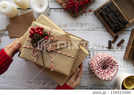 close up hands holding gifts close up hands holding gifts 116031890