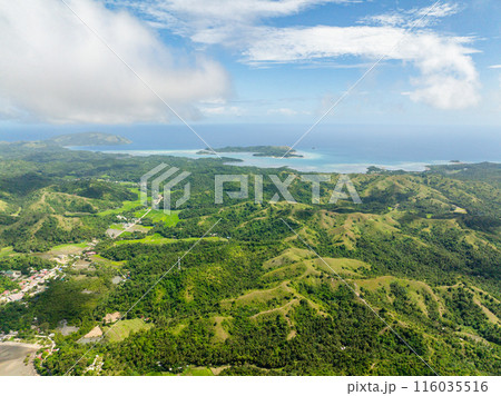 Island with green forest and hills. Agricultural land in Santa Fe, Tablas, Romblon. Philippines. 116035516