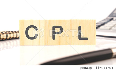 CPL Cost Per Lead word written on wooden cubes in a composition with a calculator, a pen and a fragment of a notebook 116044704