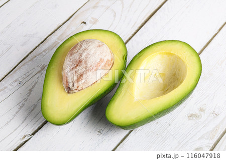 Ripe raw exotic avocado fruit 116047918