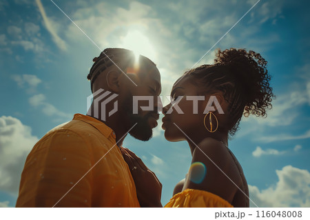 Couple in love embracing under a bright sky, sharing an intimate moment with the sun shining brightly in the background. Couple in love embracing under a bright sky, sharing an intimate moment with the sun shining brightly in the background. 116048008