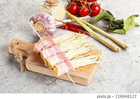 Raw Enoki mushroom with bacon Raw Enoki mushroom with bacon 116048127