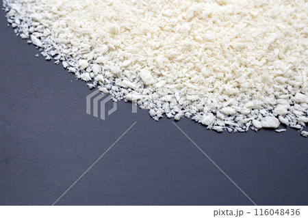 Bread crumbs on dark background. 116048436