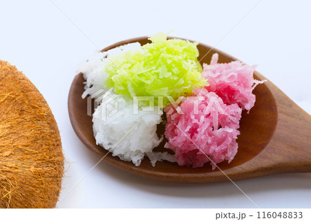 Sweet coconut balls, crispy coconut candies (Maprao Gaew). Thai traditional dessert 116048833
