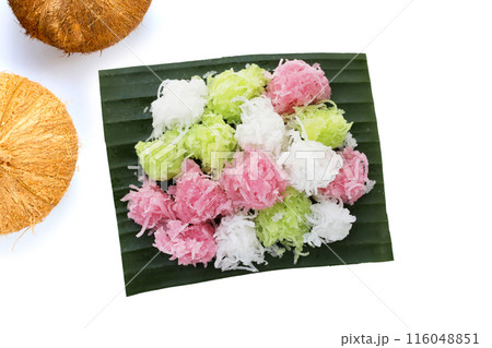 Sweet coconut balls, crispy coconut candies (Maprao Gaew). Thai traditional dessert 116048851