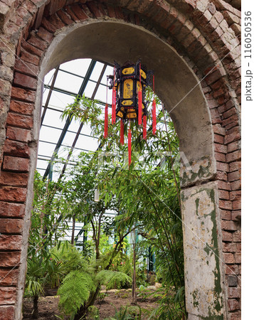 Chinese New Year's lantern hangs in a brick arch Chinese New Year's lantern hangs in a brick arch 116050536
