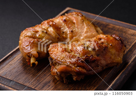 Delicious grilled chicken leg or quarter with salt and spices 116050903