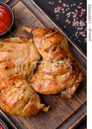 Delicious grilled chicken leg or quarter with salt and spices 116050908