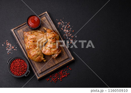 Delicious grilled chicken leg or quarter with salt and spices Delicious grilled chicken leg or quarter with salt and spices 116050910