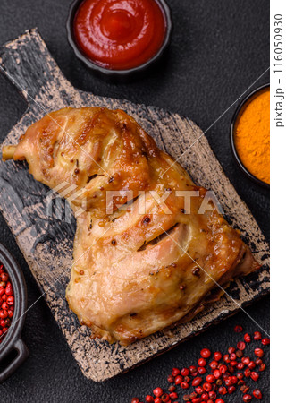Delicious grilled chicken leg or quarter with salt and spices Delicious grilled chicken leg or quarter with salt and spices 116050930
